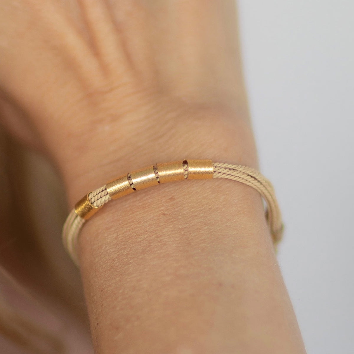 NART rings buriti bracelet worn by model, women's artisan bracelet, buy at DOORS NYC