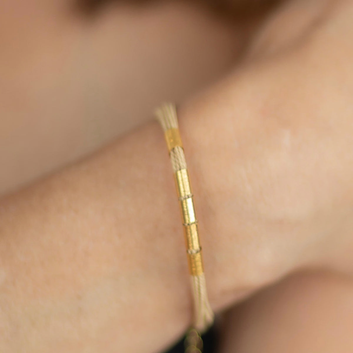 NART rings buriti bracelet close-up on model, buy at DOORS NYC