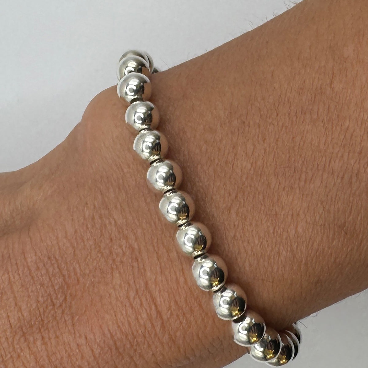 NART silver stackable bracelet 6mm styled look on wrist, women's silver bracelet, buy at DOORS NYC