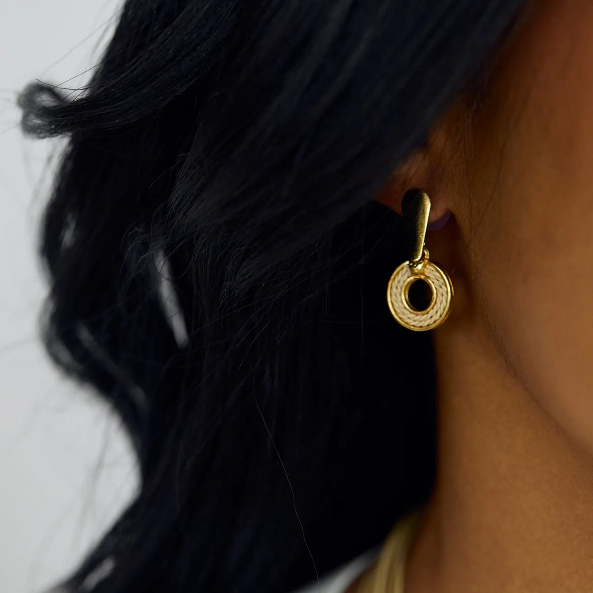 NART single round buriti fiber earrings worn by model, women's artisan earrings, buy at DOORS NYC