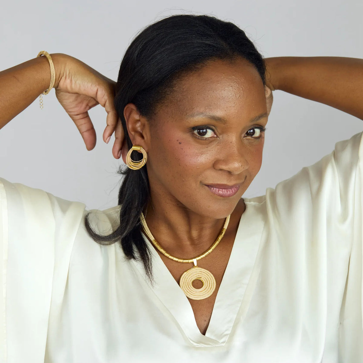 NART spiral buriti fiber necklace large worn by model, women's artisan necklace, buy at DOORS NYC