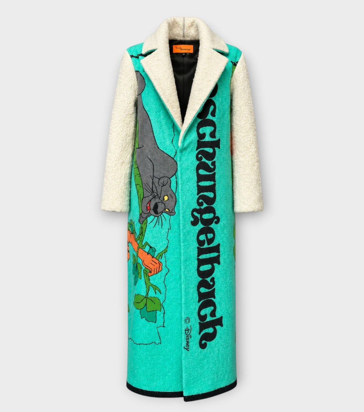 STUDIO WUNDERBAR Jungle Book Coat: turquoise graphic long coat with a Bagheera panther illustration from The Jungle Book and cream sleeves, upcycled one-of-a-kind coat, product photo, buy at DOORS NYC