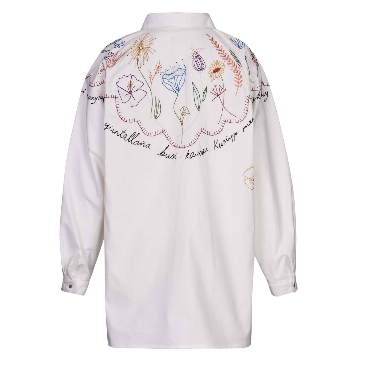 White shirt with colorful floral embroidery on a white background