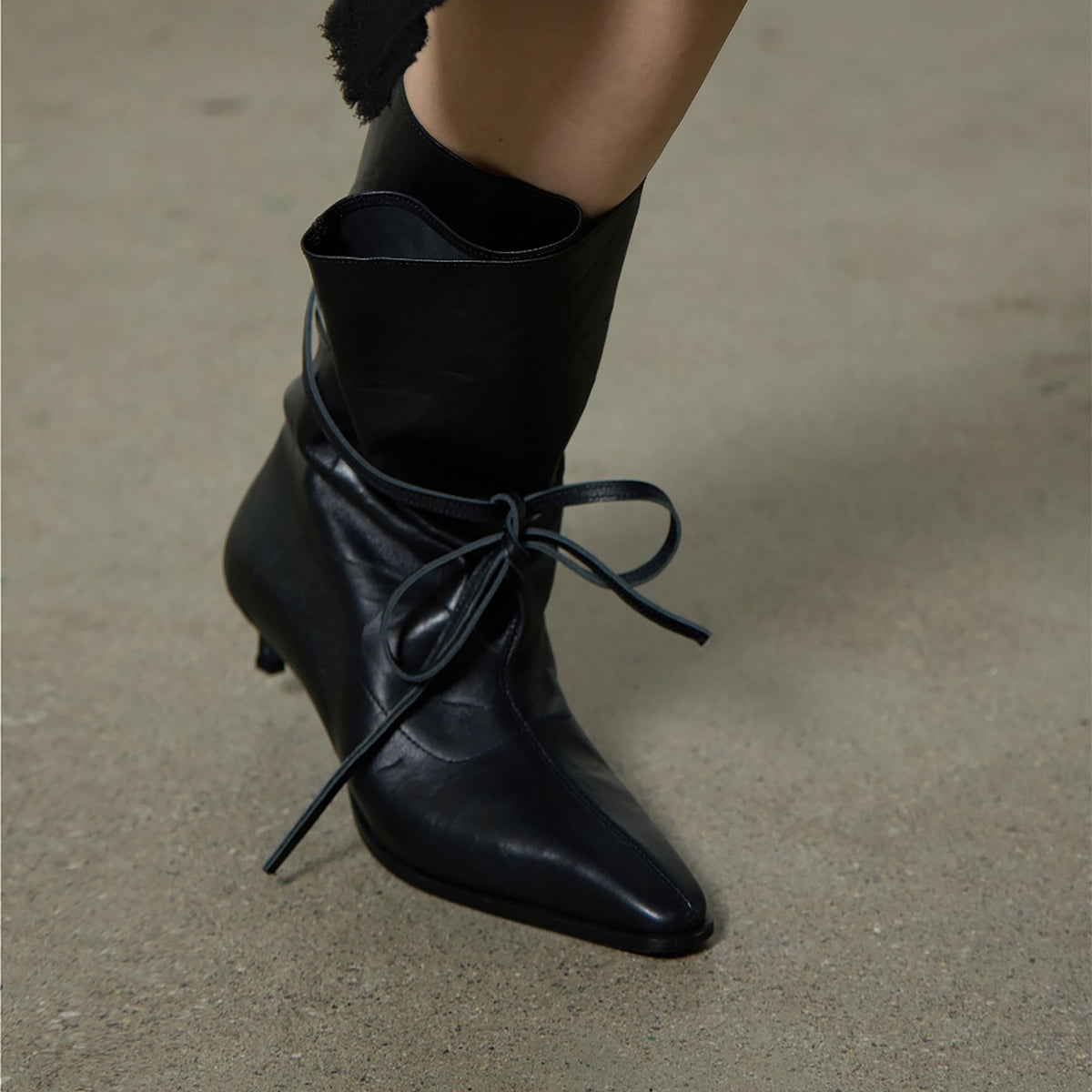 Black Folded-Top Leather Ankle 
Boots with Wraparound Tie