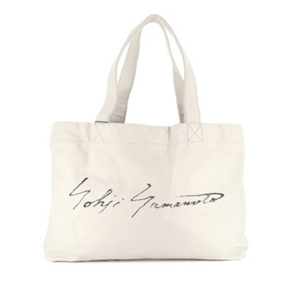 YOHJI YAMAMOTO - Signature Tote M | Ivory, buy at DOORS NYC