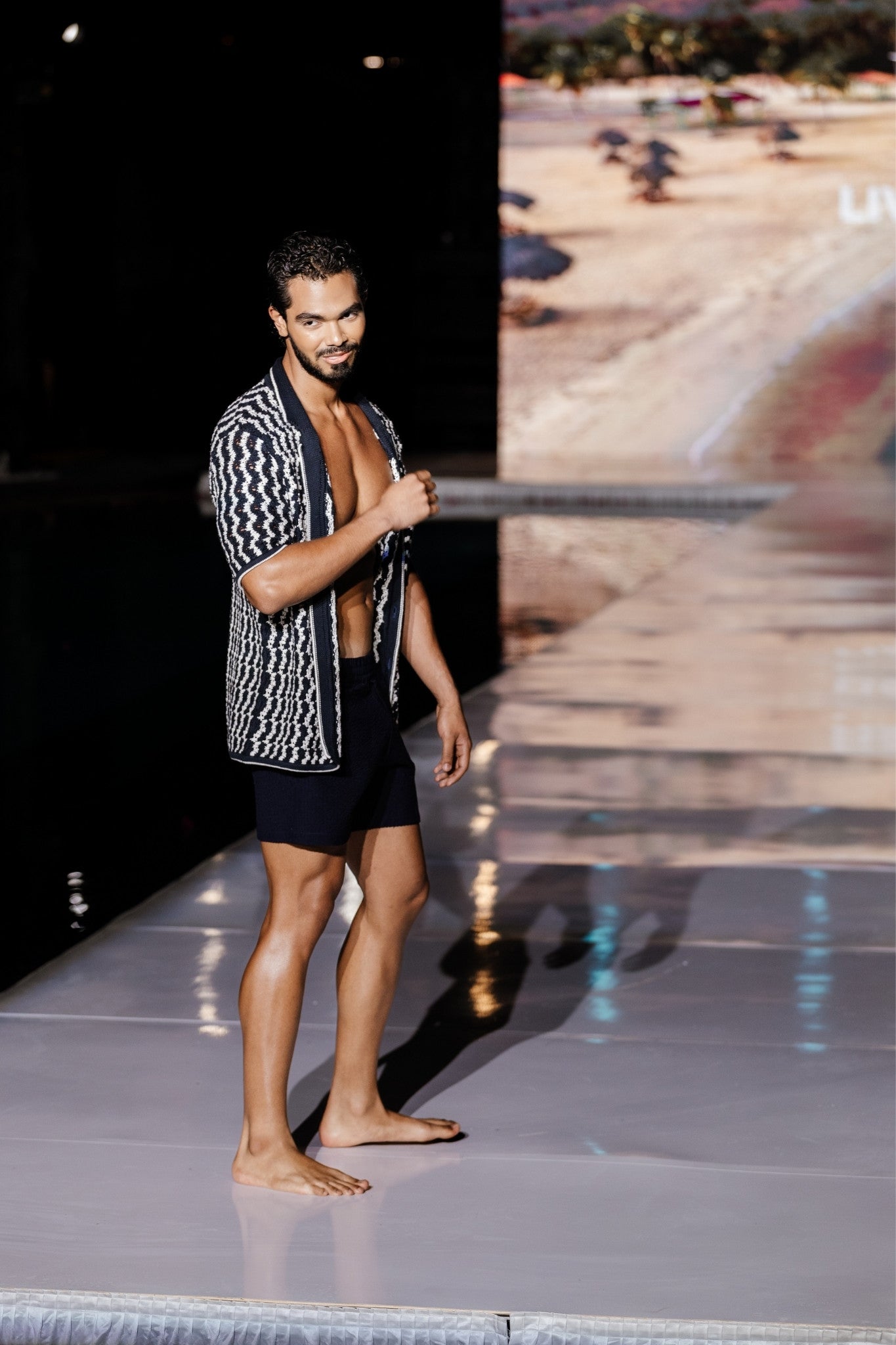 Model wearing crochet button-up shirt