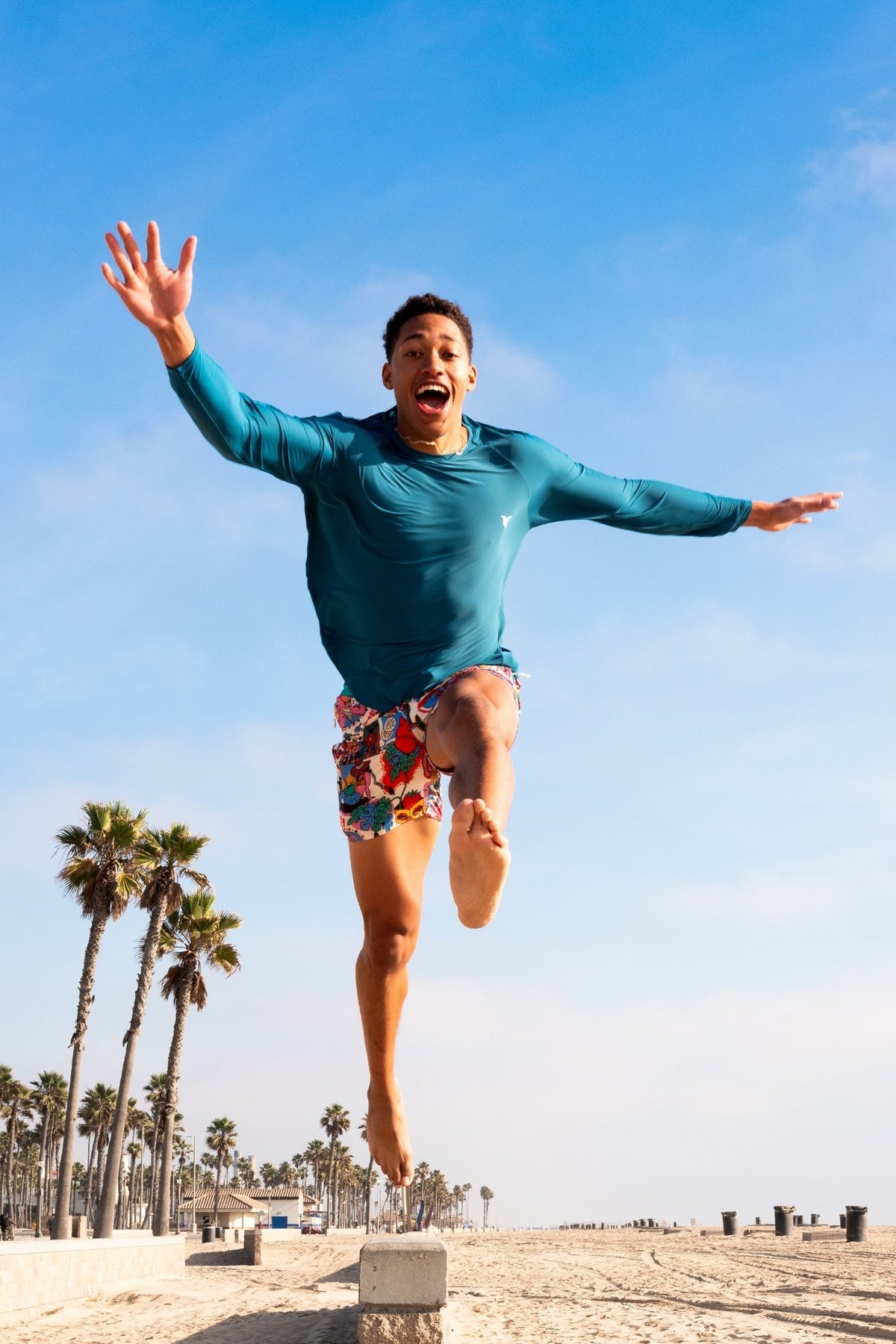 Model wearing deep ocean UPF long sleeve activity shirt outdoors