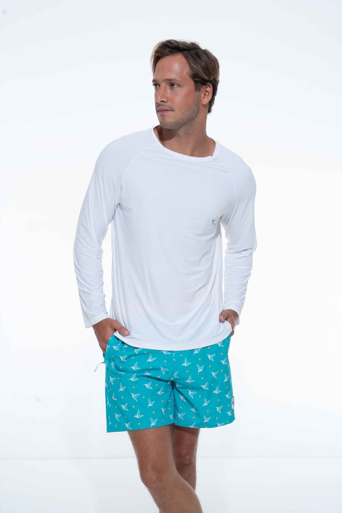 Model wearing white UPF long sleeve activity shirt