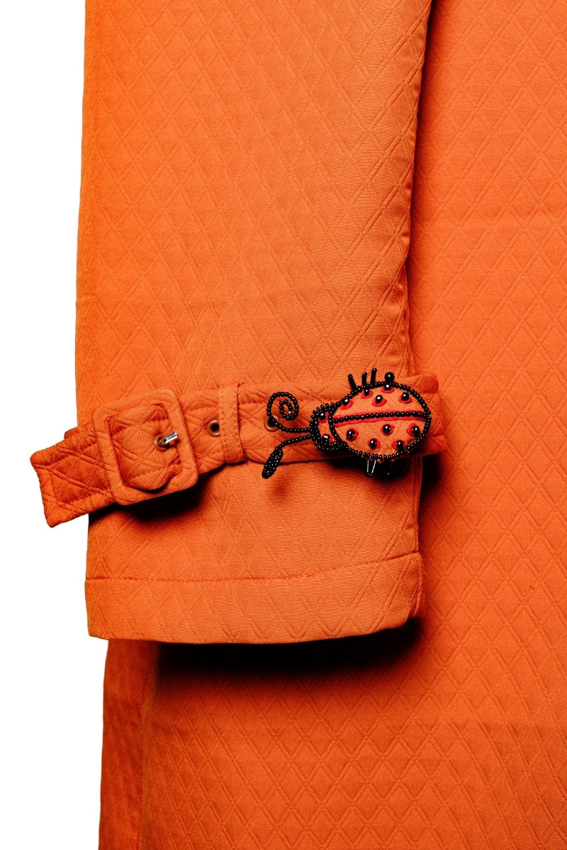 OTKUTYR - Tangerine Quilted Belted Coat with Asian Collar, buy at DOORS NYC