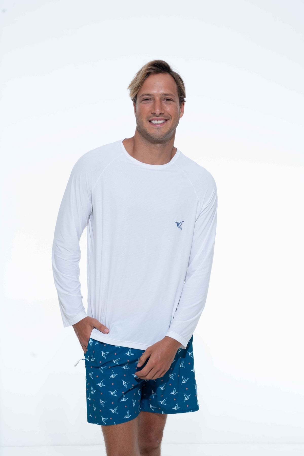 Model wearing white UPF long sleeve activity shirt