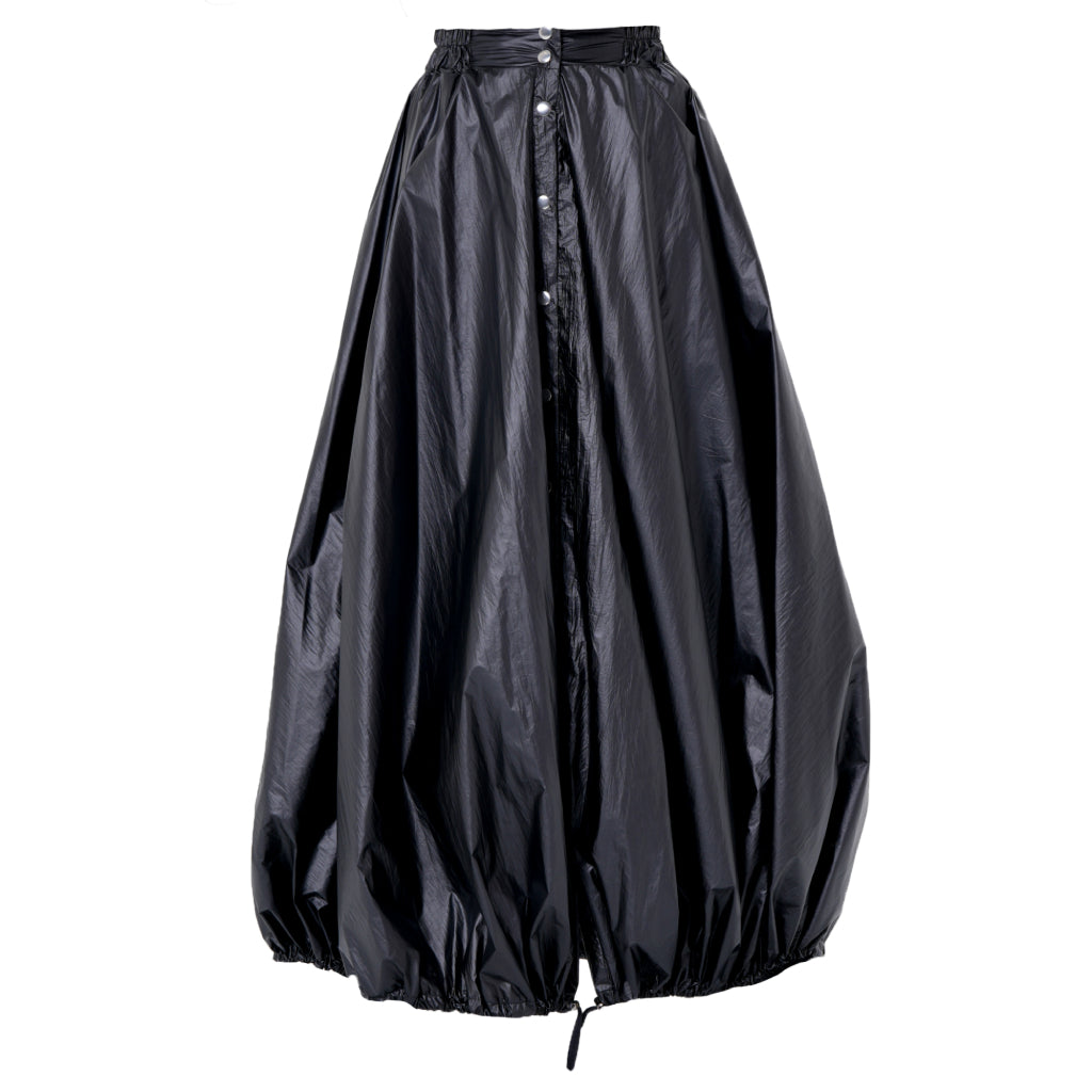The Voluminous Maxi Skirt with Adjustable Hem in Black by METAMORPHOZA features shiny, crinkled fabric, a high waist, buttoned front, and drawstring hems for a dramatic balloon silhouette.
