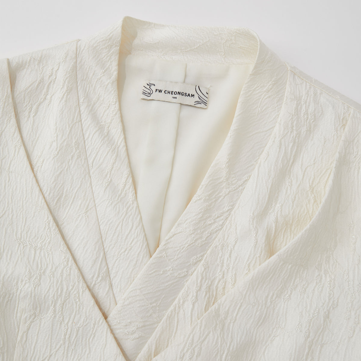 White Asymmetrical Cropped Blazer