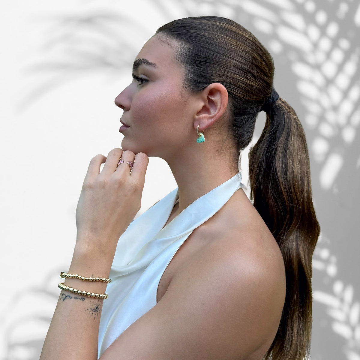 Handcrafted Hoop Earrings featuring 18k Gold Vermeil and Green Enamel.