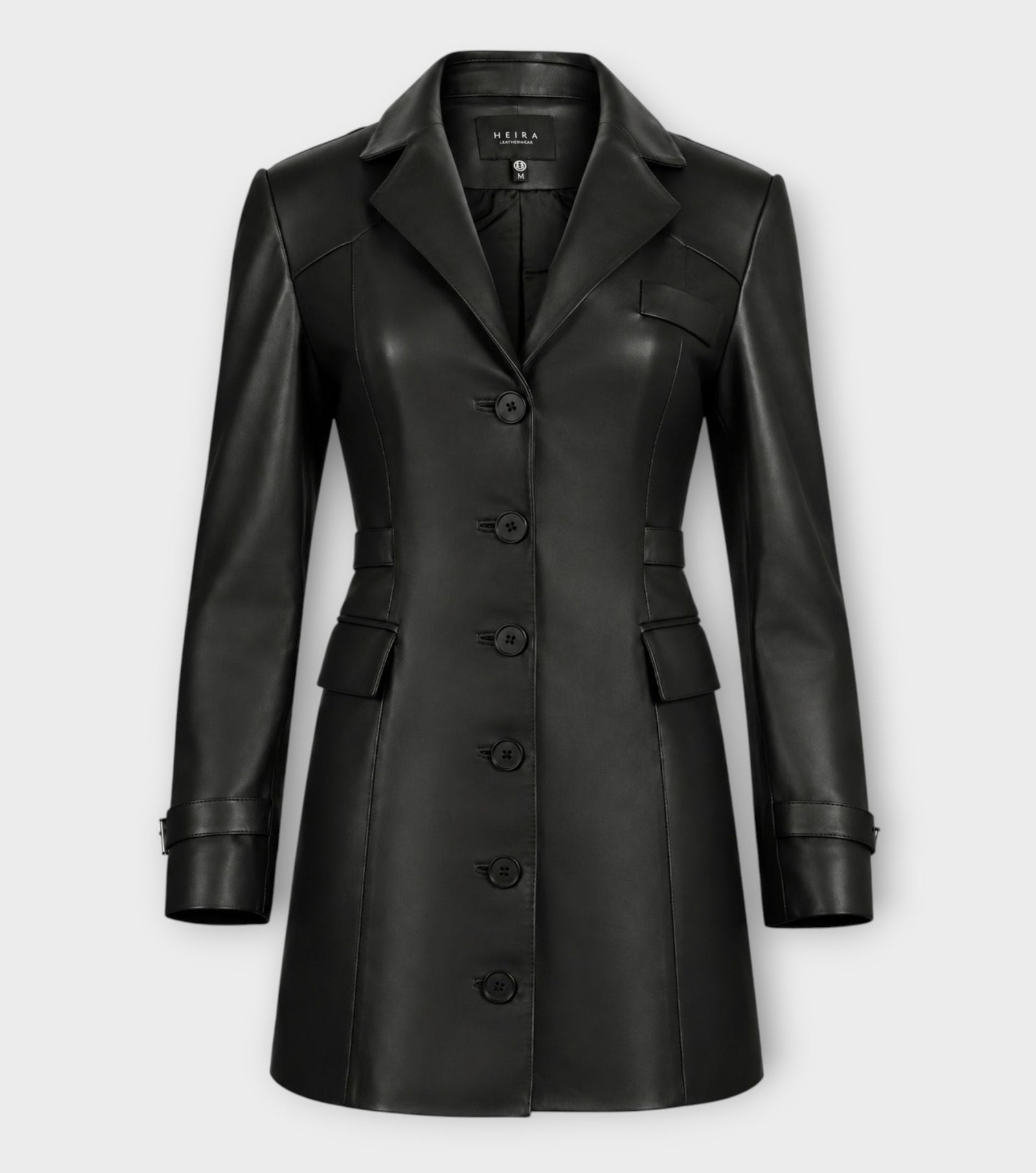 Black long-sleeved lambskin leather Femme Blazer Dress with a notched collar, a tailored silhouette, six front buttons, and two flap pockets at the waist.