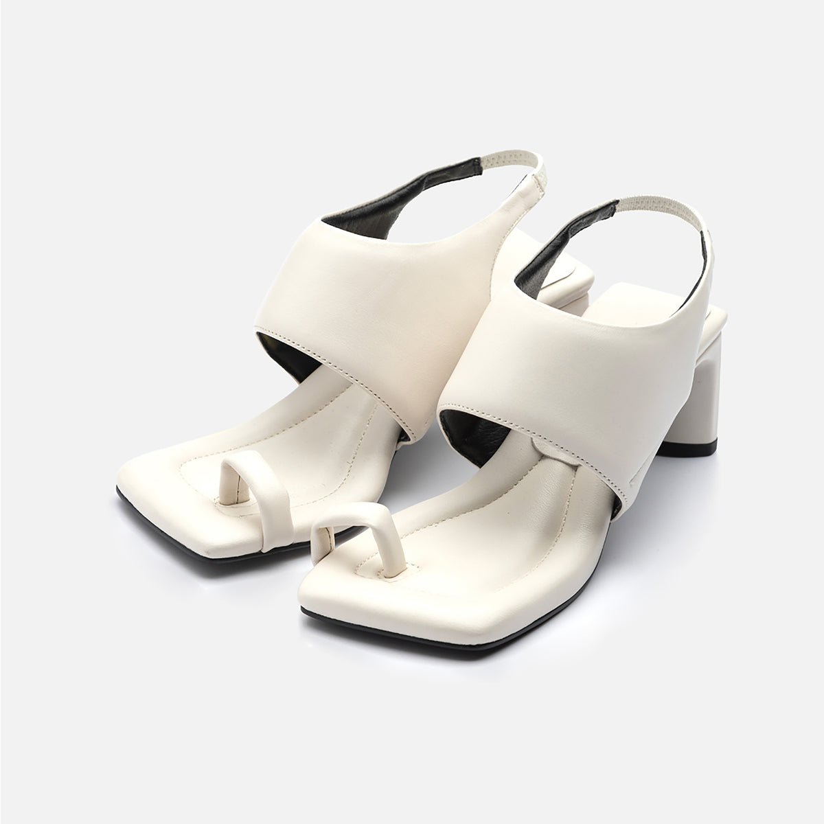 The THEN White Square-Toe Slingback Heeled Sandals feature a minimalist design with wide front straps, square open toes, and black soles, inspired by handcrafted Korean sandals.