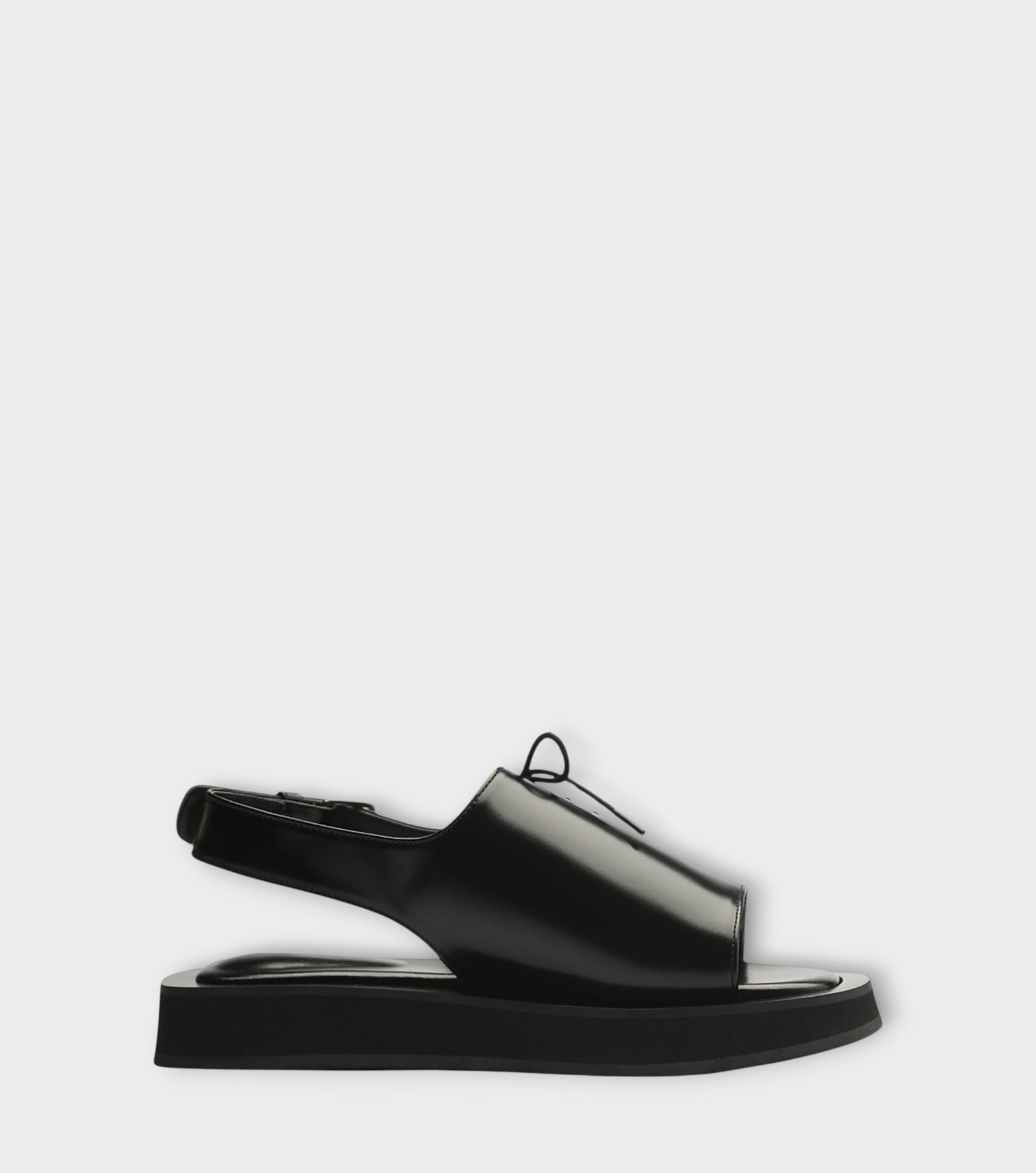 Black Leather Lace‑
Front Slingback Sandals